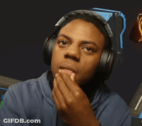 A Man Wearing Headphones Is Covering His Face GIF