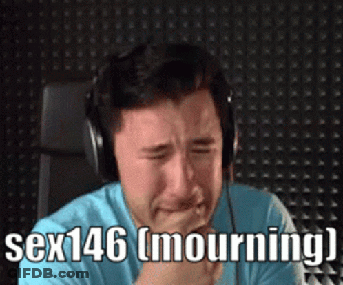 A Man Wearing Headphones Is Crying With The Words Sex146 Mourning GIF