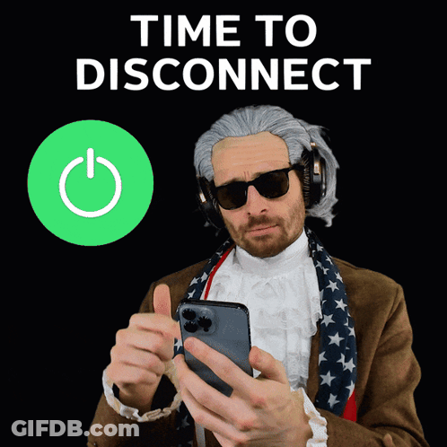 A Man Wearing Headphones Is Holding A Cell Phone In Front Of A Sign That Says " Time To Disconnect " GIF