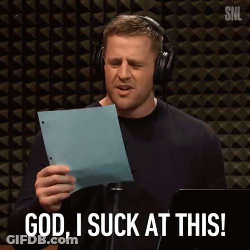 A Man Wearing Headphones Is Holding A Piece Of Paper And Saying " God I Suck At This " GIF