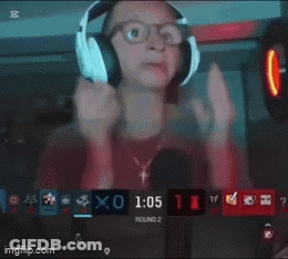 A Man Wearing Headphones Is Holding A Remote Control And Says To The Right Coming Through That Door Left Left .. GIF