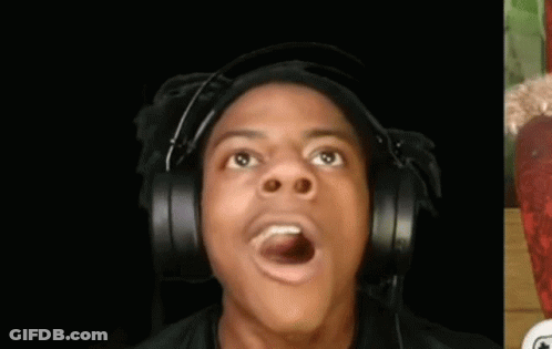 A Man Wearing Headphones Is Making A Funny Face And Looking Up . GIF