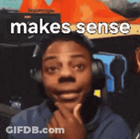 A Man Wearing Headphones Is Making A Funny Face And The Words `` Makes Sense '' Are Above Him . GIF
