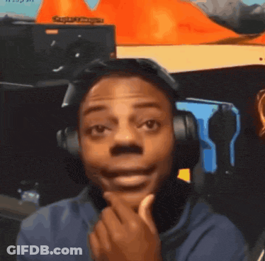 A Man Wearing Headphones Is Making A Funny Face In Front Of A Sign That Says Captain Morgan GIF