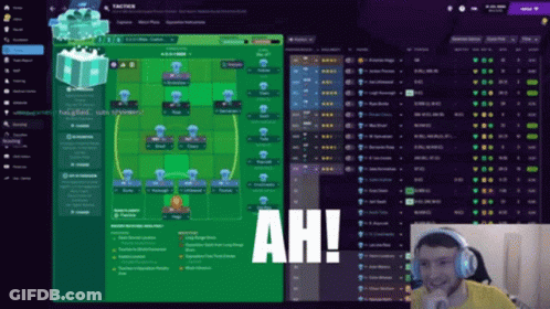 A Man Wearing Headphones Is Playing A Video Game With The Word Ah Written On The Screen GIF