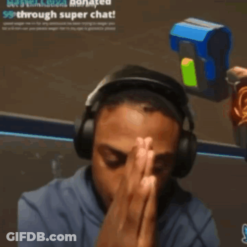 A Man Wearing Headphones Is Praying In Front Of A Sign That Says " See A Donation Donated Through Super Chat " GIF