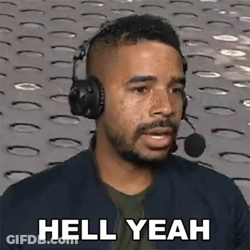 A Man Wearing Headphones Is Saying Hell Yeah GIF