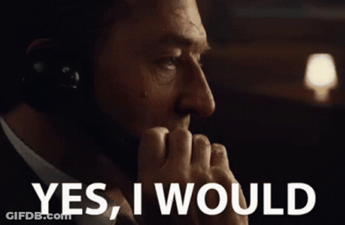 A Man Wearing Headphones Is Saying Yes I Would GIF