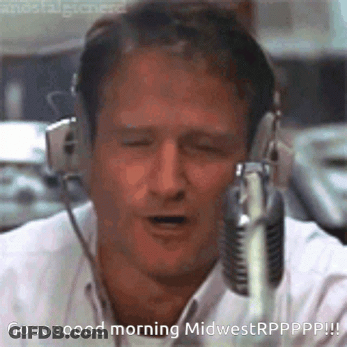 A Man Wearing Headphones Is Singing Into A Microphone And The Caption Says Good Morning Midwestrppppp !! GIF