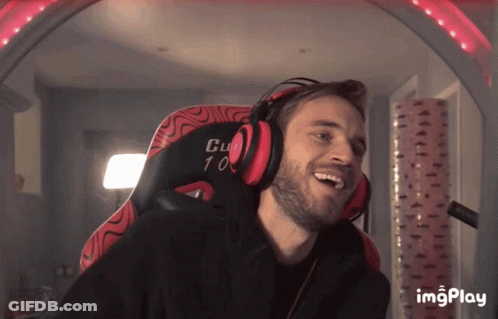 A Man Wearing Headphones Is Sitting In A Chair That Says Club 10 GIF