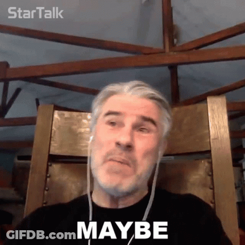 A Man Wearing Headphones Is Sitting In A Chair With The Word Maybe On His Face GIF