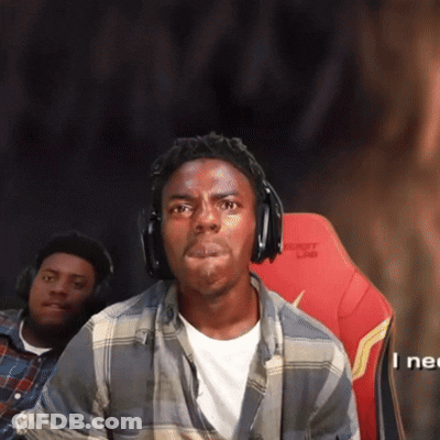 A Man Wearing Headphones Is Sitting In A Red Chair With The Word Drift On The Back GIF
