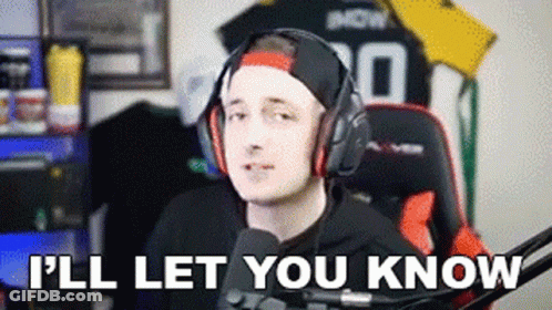 A Man Wearing Headphones Is Sitting In Front Of A Microphone And Saying `` I 'Ll Let You Know '' GIF