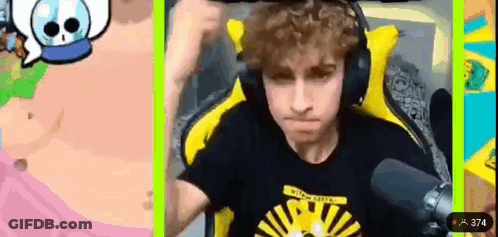 A Man Wearing Headphones Is Sitting In Front Of A Microphone In A Video Game . GIF