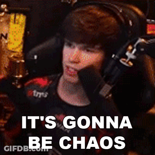 A Man Wearing Headphones Is Sitting In Front Of A Microphone With The Words It 'S Gonna Be Chaos Below Him GIF