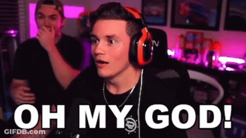 A Man Wearing Headphones Is Sitting In Front Of A Microphone With The Words `` Oh My God '' . GIF