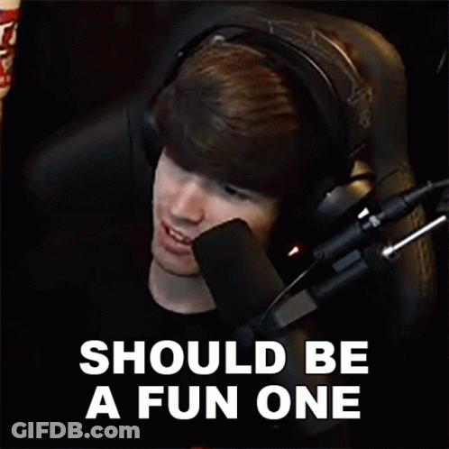 A Man Wearing Headphones Is Sitting In Front Of A Microphone With The Words Should Be A Fun One Below Him . GIF