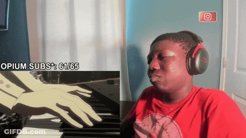 A Man Wearing Headphones Is Sitting In Front Of A Screen That Says " Opium Subs " GIF