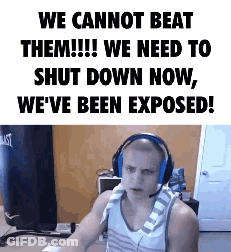A Man Wearing Headphones Is Sitting In Front Of A Sign That Says " We Cannot Beat Them " GIF