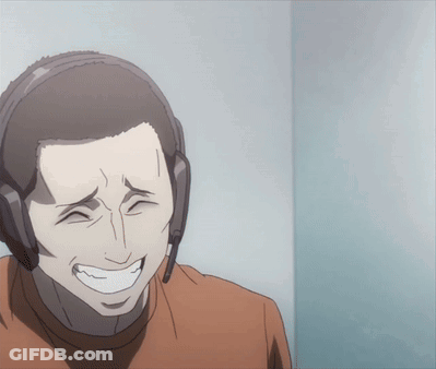 A Man Wearing Headphones Is Smiling And Making A Face GIF