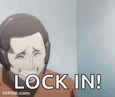 A Man Wearing Headphones Is Smiling And Saying Lock In ! GIF