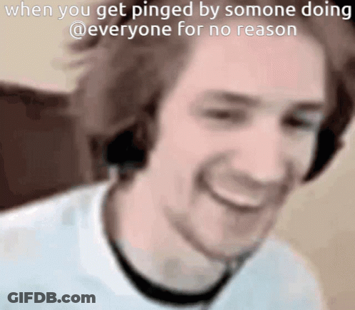 A Man Wearing Headphones Is Smiling And Says When You Get Pinged By Somone Doing GIF