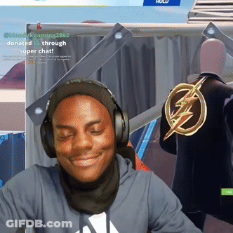 A Man Wearing Headphones Is Smiling In Front Of A Sign That Says ' Donate Through Super Chat ' GIF