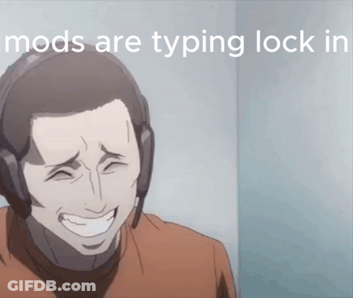 A Man Wearing Headphones Is Smiling With The Words Mods Are Typing Lock In GIF