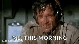 A Man Wearing Headphones Is Sweating And Crying . GIF