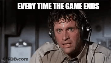 A Man Wearing Headphones Is Sweating And Making A Face . GIF