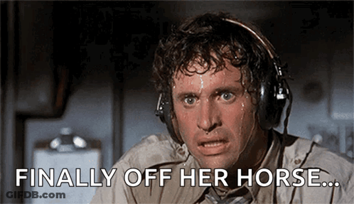 A Man Wearing Headphones Is Sweating And Says Finally Off Her Horse ... GIF