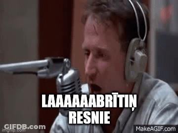A Man Wearing Headphones Is Talking Into A Microphone And Holding A Gun . GIF