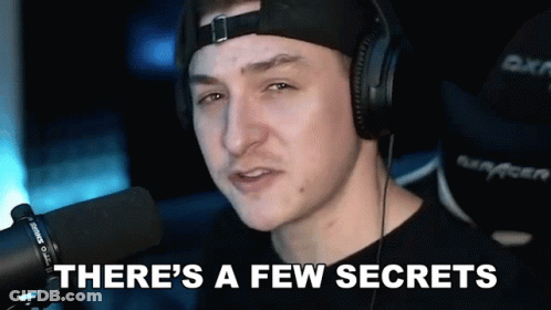 A Man Wearing Headphones Is Talking Into A Microphone And Saying There 'S A Few Secrets . GIF