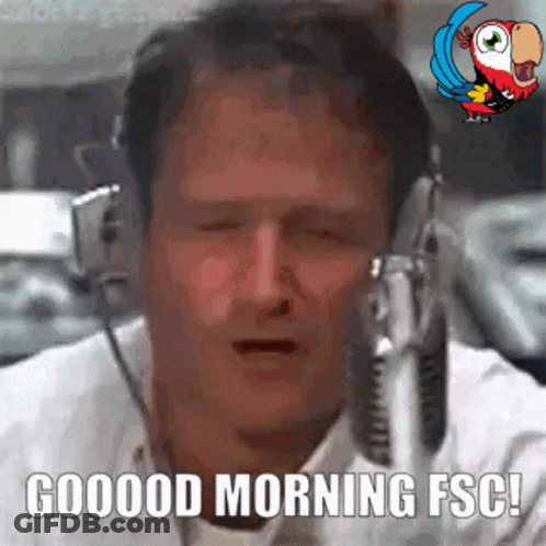 A Man Wearing Headphones Is Talking Into A Microphone And Says Good Morning Fsc GIF