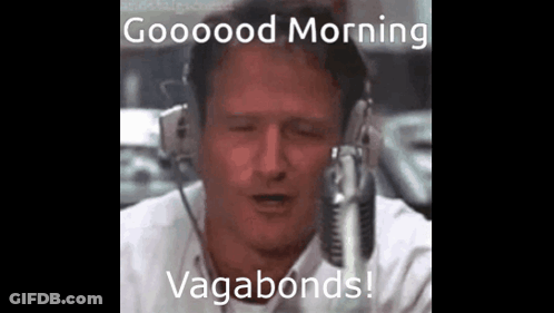 A Man Wearing Headphones Is Talking Into A Microphone And Says Good Morning Vagabonds . GIF