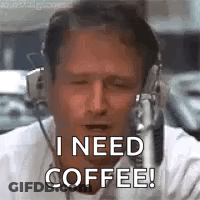 A Man Wearing Headphones Is Talking Into A Microphone And Says `` I Need Coffee ! '' GIF