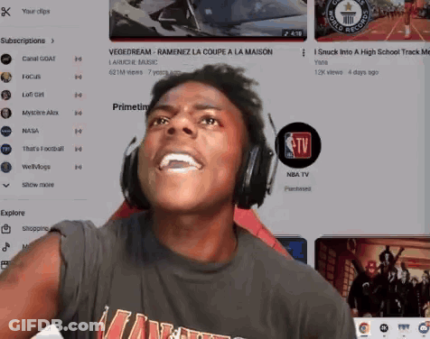 A Man Wearing Headphones Is Watching A Youtube Video GIF