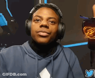 A Man Wearing Headphones Looks At The Camera With A Twitter Logo Behind Him GIF
