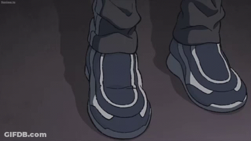 A Man Wearing Headphones Looks Out A Window In A Cartoon GIF