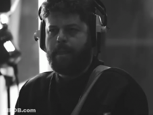 Man Wearing Headphones Playing Guitar GIF