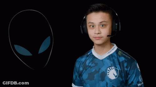 A Man Wearing Headphones Points To An Alien Drawing GIF