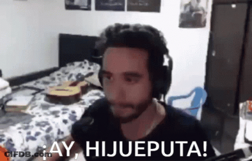 A Man Wearing Headphones Says " Ay Hijueputa " In Spanish GIF