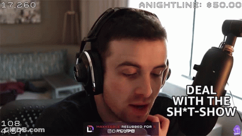 A Man Wearing Headphones Says Deal With The Shit Show GIF