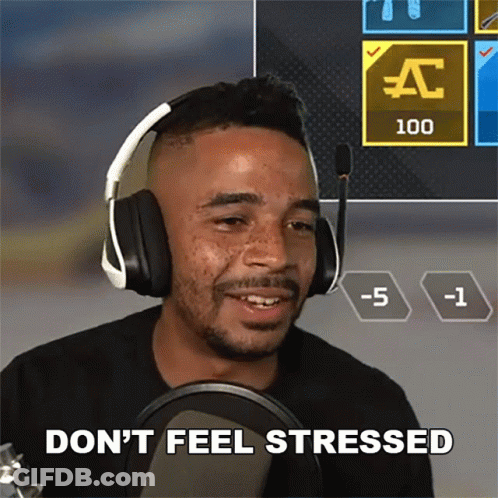 A Man Wearing Headphones Says " Don 'T Feel Stressed " In Front Of A Microphone GIF