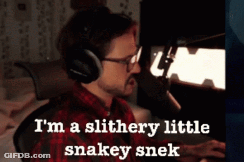 A Man Wearing Headphones Says I 'M A Slithery Little Snakey Snek GIF