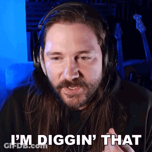 A Man Wearing Headphones Says " I 'M Digging That " GIF