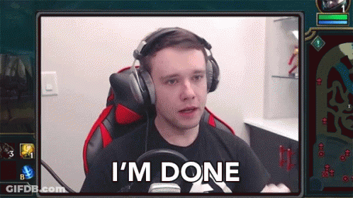 A Man Wearing Headphones Says " I 'M Done " In Front Of A Video Game Screen GIF