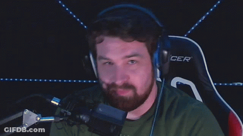 A Man Wearing Headphones Says " It 'S Free Real Estate " While Sitting In Front Of A Microphone GIF