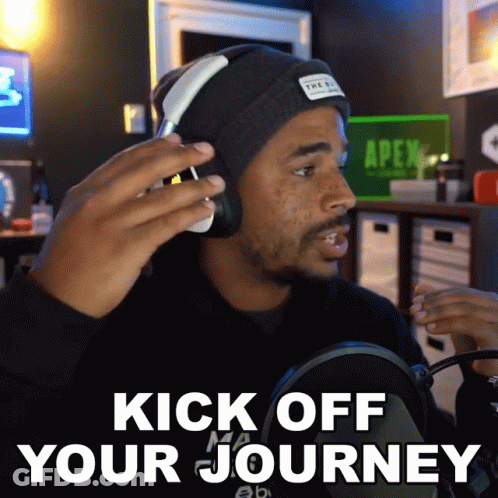 A Man Wearing Headphones Says Kick Off Your Journey In Front Of A Microphone GIF