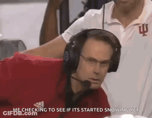 A Man Wearing Headphones Says Me Checking To See If Its Started Snowing Yet GIF
